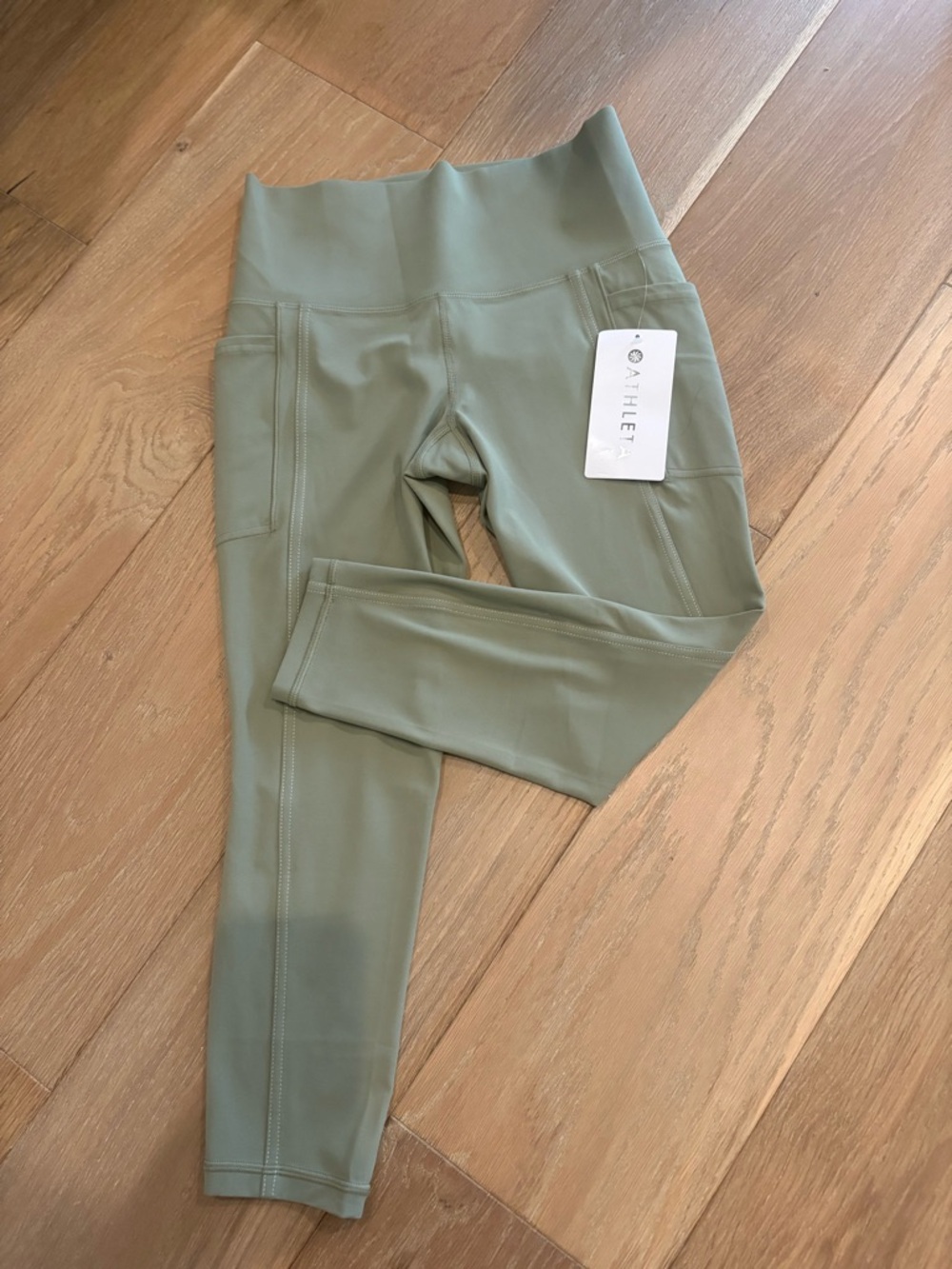 NWT Athleta Salutation Stash 7/8 Leggings in Olive Pop Stitch